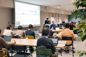 【国内市場No.1】AI翻訳サービスのロゼッタが、神戸大学DX・情報統括本部主催“DXプレイグラウンド”で「オンヤク」を紹介。参加した学生・大学職員・教員は、リアルタイム音声翻訳の実力に驚き