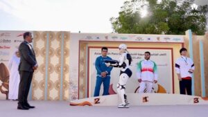 Teknologi yang Mendukung Kejayaan Olahraga: AiMOGA Robotics Wujudkan Acara Penyerahan Medali yang Didampingi Robot dalam Ajang Olahraga Internasional